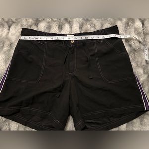 Women’s black and purple Board shorts. castawaves brand. Size XL